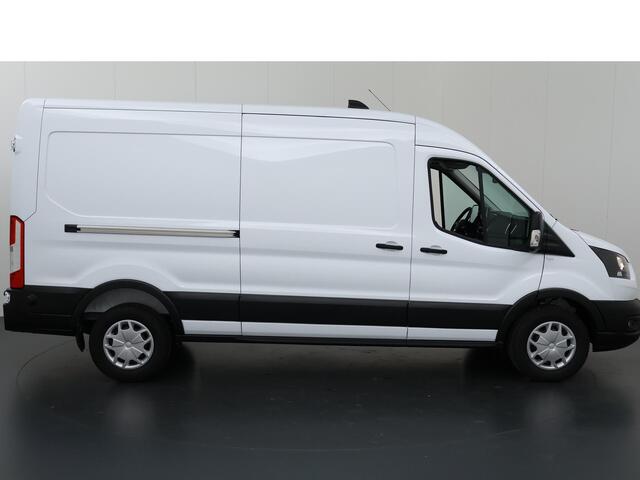 Ford TRANSIT 350 | 2.0 TDCI | L3 H2 | Trend | Navigatie | Stoelverwarming | Trekhaak 2500 KG AHW | Airco | 3-Zits | NIEUW | Carplay - Android Auto | Laadruimte Pakket | Cruise Control | Multifuntioneel Stuurwiel