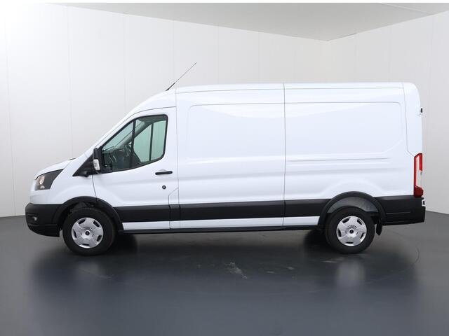 Ford TRANSIT 350 2.0 TDCI | L3 H2 | TREND | ADAPTIEVE CRUISE | STOELVERWARMING | TREKHAAK | STUURWIELVERWARMING | CAMERA | PARKEERSENSOREN | NAVIGATIE | CARPLAY / ANDROID AUTO | BLIND SPOT | INKLAPBARE SPIEGELS