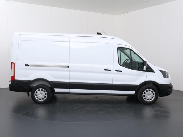 Ford TRANSIT 350 | 2.0 TDCI | L3 H2 | Trend | TREKHAAK 2500 KG AHW | CLIMATE CONTROL | NAVIGATIE | PARKEERSENSOREN V+A | CRUISE CONTROL | BIJRIJDERSBANK | LAADRUIMTE PAKKET | APPLE CARPLAY / ANDROID AUTO | STOEVERWARMING
