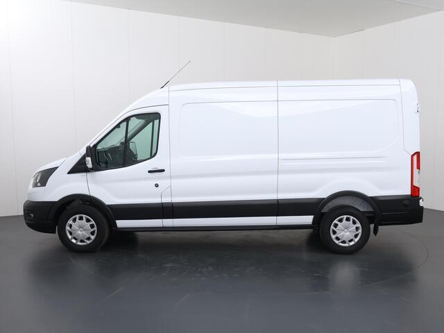 Ford TRANSIT 350 | 2.0 TDCI | L3 H2 | Trend | TREKHAAK 2500 KG AHW | CLIMATE CONTROL | NAVIGATIE | PARKEERSENSOREN V+A | CRUISE CONTROL | BIJRIJDERSBANK | LAADRUIMTE PAKKET | APPLE CARPLAY / ANDROID AUTO | STOEVERWARMING