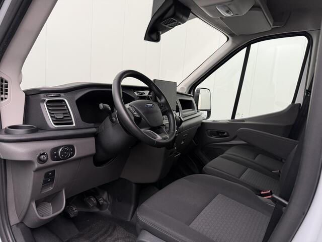 Ford TRANSIT 130PK L3H2 | Navigatie | Camera | Airco | Fabrieksgarantie | Cruise | Trekhaak | Betimmering | 3-Zits