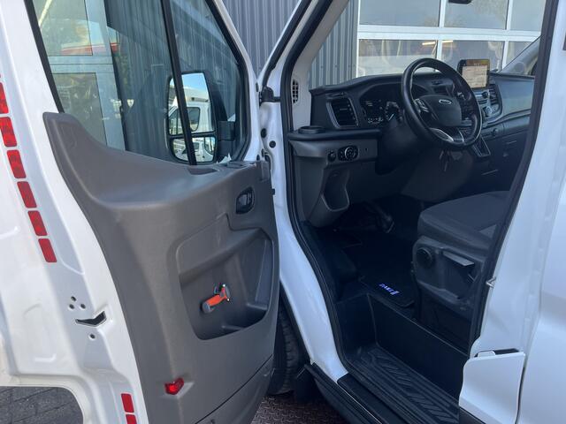 Ford TRANSIT 350 2.0 TDCI L2H2 RWD 170pk Kastinrichting Werkplaatsinrichting Airco Cruise controle Navigatiesysteem Telefoonverbinding Parkeersensoren voor en achter 2-Persoons Bpm vrij Sortimo Werkplaats Omvormer St