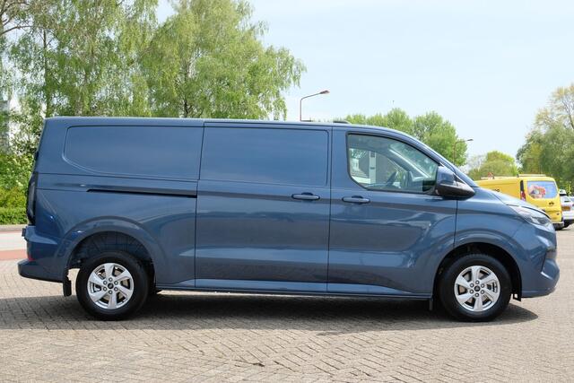 Ford TRANSIT CUSTOM 320 2.0 TDCI L2H1 Limited | Automaat 136pk | Adaptive cruise control | Dubbele schuifdeur (2x) | 8-weg bestuurdersstoel + passagiersstoel | Stoelverwarming | Dodehoeksensoren | Navigatie | Elektrisch inklapbare spiegels | 16 inch lichtmetalen velgen | Ful