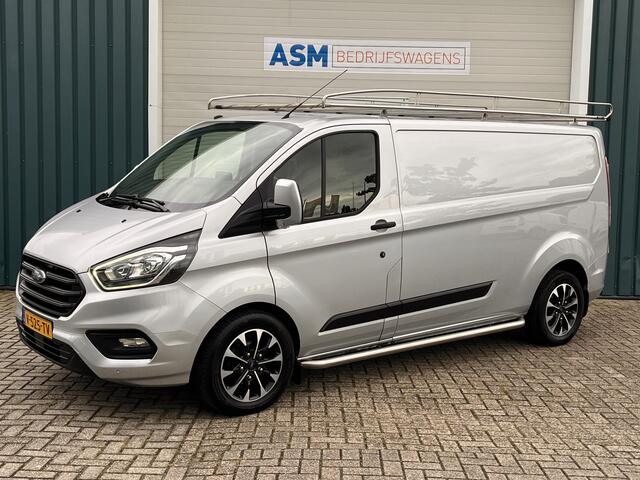 Ford TRANSIT CUSTOM 300 2.0 131Pk TDCI L2H1 Trend / Cruise / Airco / Navi / IMPERIAAL / Trekhaak / Lease ¤393,-pm / Apk t/m 25-04-2025