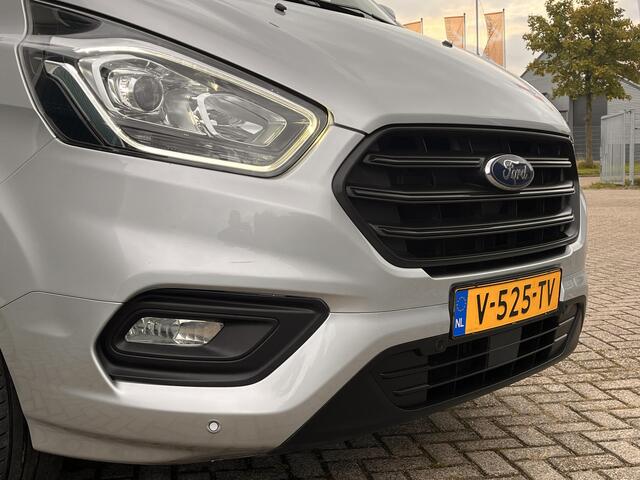 Ford TRANSIT CUSTOM 300 2.0 131Pk TDCI L2H1 Trend / Cruise / Airco / Navi / IMPERIAAL / Trekhaak / Lease ¤393,-pm / Apk t/m 25-04-2025