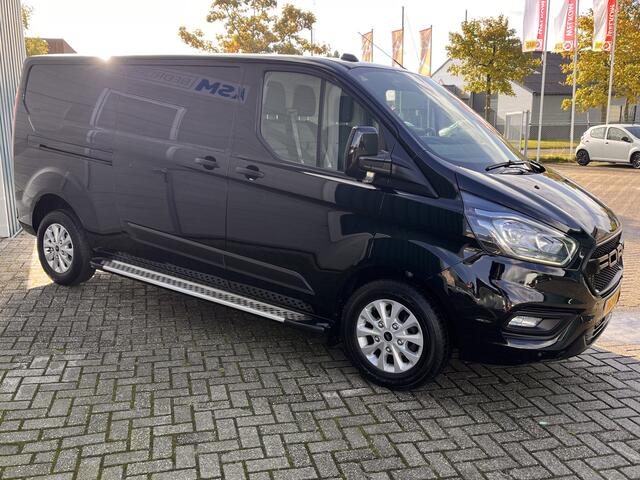Ford TRANSIT CUSTOM 300 2.0 130Pk TDCI L2H1 Trend / Cruise / Airco / Trekhaak / Lease ¤413,- pm / Apk t/m 19-06-2025