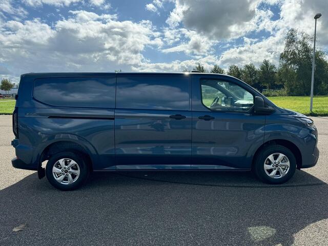 Ford TRANSIT CUSTOM 320 2.0 TDCI L2H1 Trend Automaat 136pk | SCI | Adaptive cruise control | | 8-weg bestuurderstoel + passagiersbank | Stoelverwarming | Dodehoeksensoren | Navigatie | Elektrisch inklapbare spiegels | 16 inch lichtmetalen velgen | Full LED | Dual-zone climat