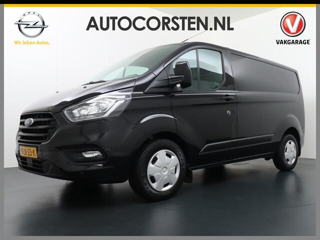 Ford TRANSIT CUSTOM 2.0D 130PK L1H1 3pers. Airco PDC-a+v Trekhaak Cruise-Controle voorruit verwarmbaar Betonplex Schuifdeur-r Tussenwand voorruit verwarmbaar Led Bumpers+Spiegels-in-kleur Trend Elektr.Ramen+Spiegels+Verwarmd Centr.vergr+afst.b.320 2.0 TDCI Adaptieve bochtver