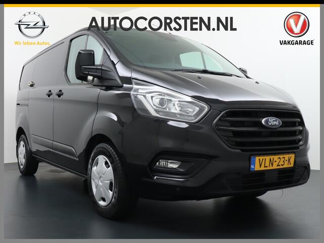 Ford TRANSIT CUSTOM 2.0D 130PK L1H1 3pers. Airco PDC-a+v Trekhaak Cruise-Controle voorruit verwarmbaar Betonplex Schuifdeur-r Tussenwand voorruit verwarmbaar Led Bumpers+Spiegels-in-kleur Trend Elektr.Ramen+Spiegels+Verwarmd Centr.vergr+afst.b.320 2.0 TDCI Adaptieve bochtver