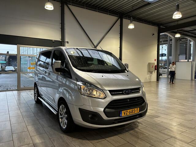 Ford TRANSIT CUSTOM 270 2.2 TDCI L1H1 Anniversary Edition Dubbele Cabine | Leer | Camera | 18" | Trekhaak | Navi | Clima | Cruise | Dubbele schuifdeur