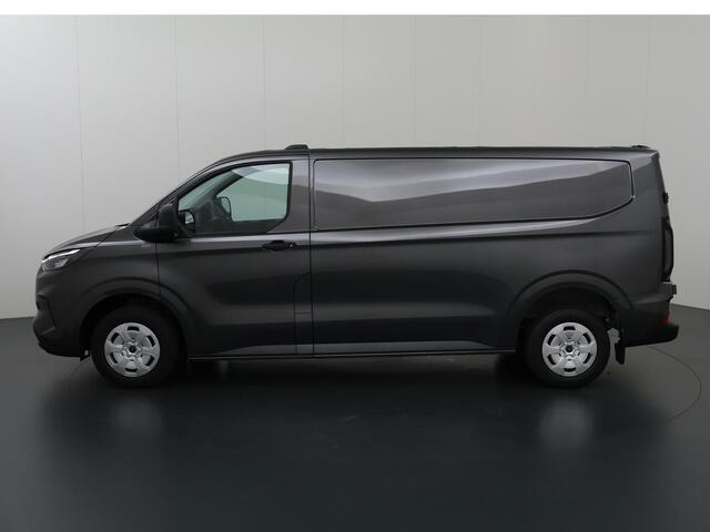 Ford TRANSIT CUSTOM 320 2.0 TDCI 136 PK aut. | L2 H1 | Trend | Climate Control | Laadruimte Pakket | Parkeercamera | Digitaal Instrumentenpaneel | Parkeersensoren | Stoelverwarming | Magnetic Metallic | Apple Carplay - Android Auto