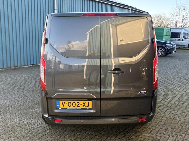 Ford TRANSIT CUSTOM 280 2.0 131Pk TDCI L1H1 Limited / Cruise / Airco / Navi / Apk t/m 19-03-2025
