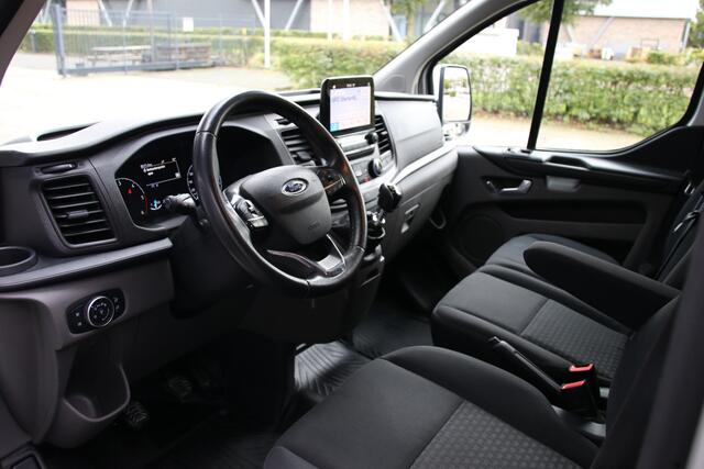 Ford TRANSIT CUSTOM 340 2.0 TDCI L2H1 | L+R Schuifdeur | Navigatie | Blind Spot | CarPlay | Camera | Standkachel | Trekhaak | 3-Zitter | Nieuwe APK | Onderhoudsbeurt