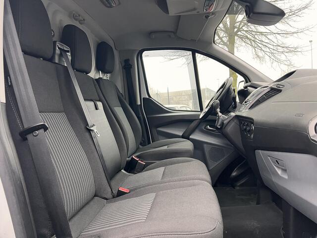 Ford TRANSIT CUSTOM 270 2.2 TDCI L1H1 Trend 2e Eigenaar,Trekhaak,Camera,Navi,Pdc,3-Zits,6 Bak,101pk,Stoelverwarming,Dealer Onderhouden,Apk tot 01-2026