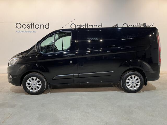 Ford TRANSIT CUSTOM 2.0 TDCI L1H1 Trend 130 PK Automaat / CarPlay / Camera / Airco / Cruise Control / Trekhaak / LMV / Navigatie / Klep / 3-Zits / 80.350 KM !! / BPM VRIJ !!