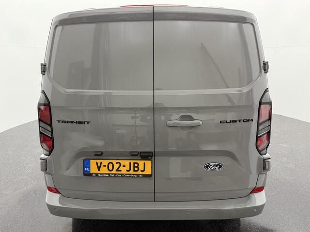 Ford TRANSIT CUSTOM 320 2.0 TDCI L2H1 Limited met o.a. Handmatige regeneratie roetfilter, 17 inch lichtmetalen velgen, Stoel- en stuurverwarming, Adaptieve cruisecontrol, dodehoekdetectie (BLIS) en een Achteruitrijcamera