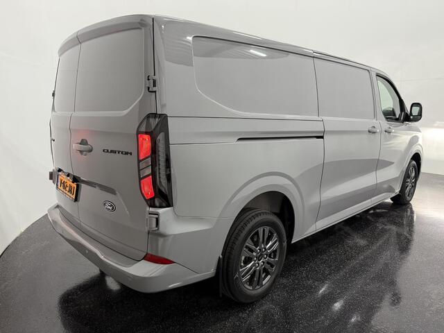 Ford TRANSIT CUSTOM 320 2.0 TDCI L2H1 Limited met o.a. Handmatige regeneratie roetfilter, 17 inch lichtmetalen velgen, Stoel- en stuurverwarming, Adaptieve cruisecontrol, dodehoekdetectie (BLIS) en een Achteruitrijcamera