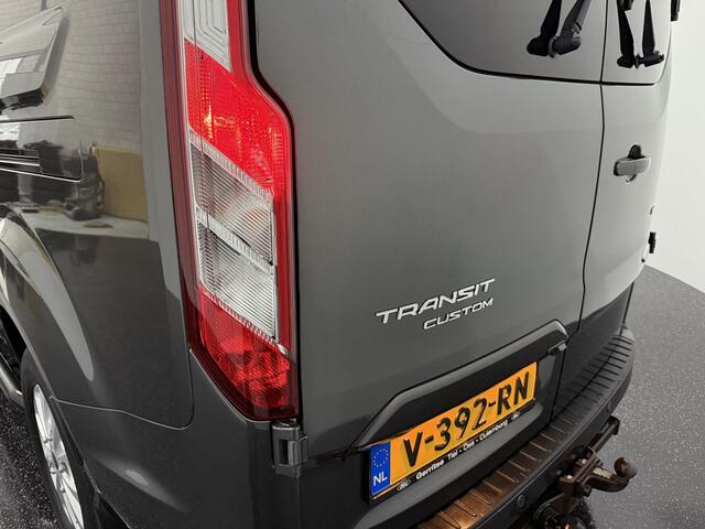 Ford TRANSIT CUSTOM 300 2.0 TDCI L2H1 Limited DC met o.a. een dubbele cabine, dubbele zijschuifdeur, achteruitrijcamera, trekhaak, navigatiesysteem en Apple Carplay/ Android Auto