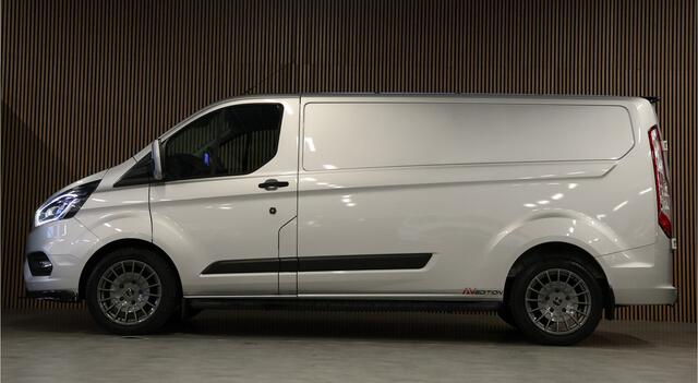 Ford TRANSIT CUSTOM 320 2.0 TDCI L2H1 Raptor Edition | Bi-Xenon | CarPlay | Navigatie | Camera | Stoelverwarming | Dodehoek detector | Lane Assist | DAB | Werkplaatsinrichting | 3-Zitter | Dealer onderhouden | Nieuwe APK