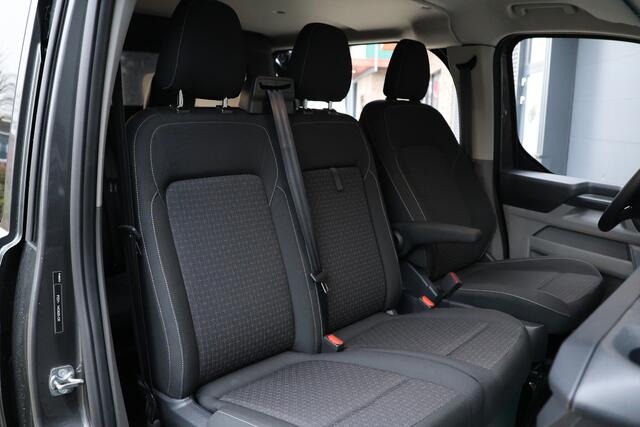 Ford TRANSIT CUSTOM 320 2.0 TDCI 170PK L2H1 LIMITED DC AUT | BPM VRIJ | L+R Schuifdeur | ACC | Blind Spot | Navigatie | Camera | CarPlay | Lane Assist | Stoelverwarming | Raptor Edition | Trekhaak | 6-Zitter | Dubbel Cabine | Verlengde fabrieksgarantie tot 09-2029