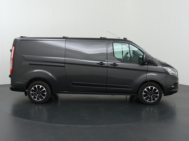 Ford TRANSIT CUSTOM 300 | 2.0 TDCI | Aut. | L2 H1 | Trend | Navigatie | Parkeercamera | Trekhaak | 3-zits | Airco | LM Velgen