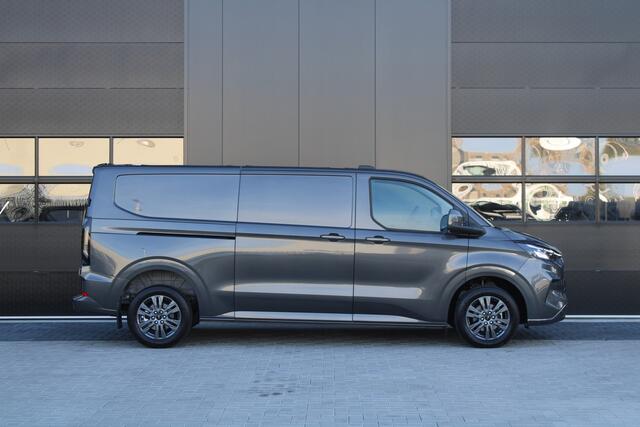 Ford TRANSIT CUSTOM 320 2.0 TDCI L2H1 Limited 170pk - 2x Schuifdeur - Adaptive Cruise - Verwarmd stuur - Blind spot - Navigatie - Camera - Draadloos laden - Rijklaar