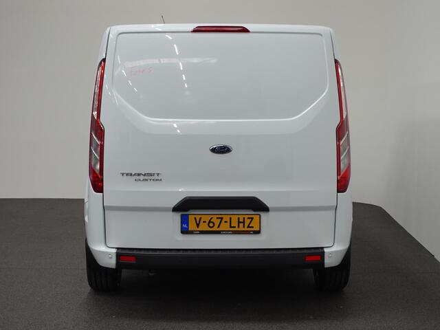 Ford TRANSIT CUSTOM 131pk L2H1 Trend Raptor Edition 2x Schuifdeur Achterklep Airco Cruise control Parkeersensoren