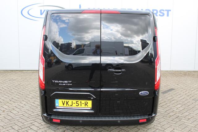Ford TRANSIT CUSTOM 300 2.0-130pk TDCI L2H1 Limited AUTOMAAT ! Keurige nette en luxe Ford Transit Custom, slechts 47.000km !. Airco, schuifdeur li+re, LM wielen, stoel-, spiegel- en voorraamverw., side en lane assist, 3-zits, navigatie, telefoonvoorb., camera, pdc v+a, cruis