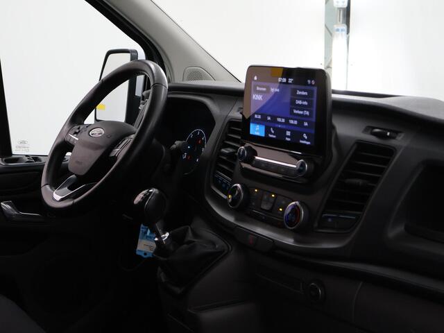 Ford TRANSIT CUSTOM 300 2.0 TDCI | 130 PK | L2 H1 | TREND | STOELVERWARMING | PARKEERSENSOREN | TREKHAAK | CARPLAY | ANDROID AUTO | AIRCO | CRUISE | 18" LICHTMETALEN WIELEN | 3-ZITS | VOORRUITVERWARMING