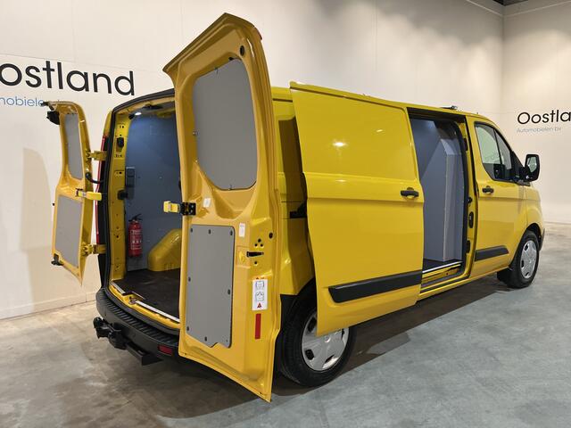 Ford TRANSIT CUSTOM 320 2.0 TDCI L2H1 Trend / Euro 6 / Airco / Cruise Control / Trekhaak / 220 V. / PDC / 65.600 KM !!