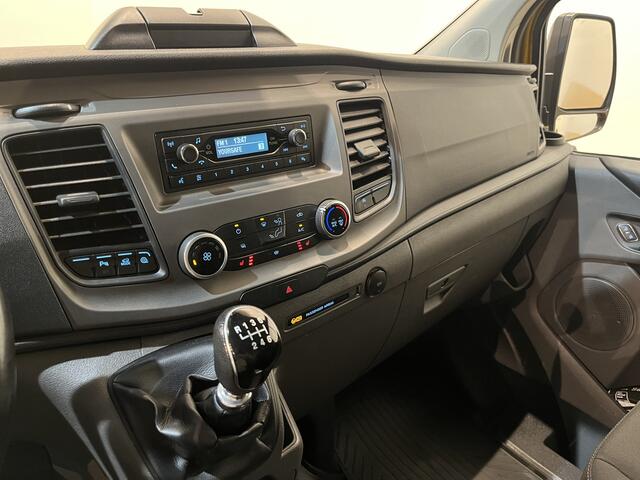 Ford TRANSIT CUSTOM 320 2.0 TDCI L2H1 Trend / Euro 6 / Airco / Cruise Control / Trekhaak / 220 V. / PDC / 65.600 KM !!