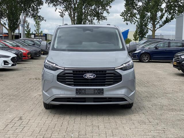 Ford TRANSIT CUSTOM 320 2.5 PHEV L2H1 Limited DC 233pk | Zuid | Dubbele Cabine | Dubbele zijschuifdeur | 12-weg verstel- en verwarmbare AGR Stoelen | Inklapbare trekhaak | 17 inch lichtmetalen velgen | Driver Assistance Pack Premium | Verwarmbaar stuurwiel | Bekleding zijwa