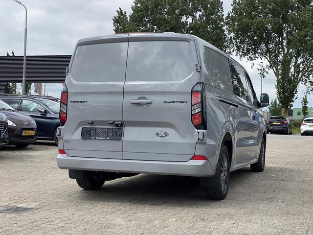 Ford TRANSIT CUSTOM 320 2.5 PHEV L2H1 Limited DC 233pk | Zuid | Dubbele Cabine | Dubbele zijschuifdeur | 12-weg verstel- en verwarmbare AGR Stoelen | Inklapbare trekhaak | 17 inch lichtmetalen velgen | Driver Assistance Pack Premium | Verwarmbaar stuurwiel | Bekleding zijwa