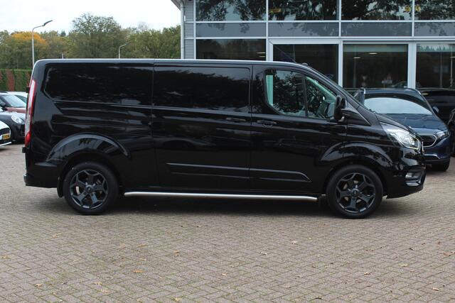 Ford TRANSIT CUSTOM 300 2.0 TDCI L2H1 Limited / Trekhaak / Camera / Leder / 2x Zijschuifdeur / Xenon / Dodehoek / 16'' / Navigatie / Dodehoek / Cruise Control