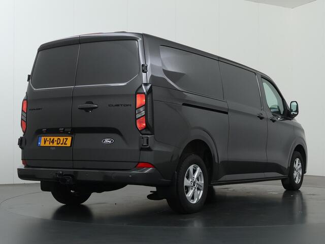 Ford TRANSIT CUSTOM 320 | 2.0 TDCI | L2 H1 | LIMITED | STOELVERWARMING | TREKHAAK | NAVIGATIE | CAMERA | PARKEERSENSOREN | METALLIC | LAADRUIMTE PAKKET | VOORRUITVERWARMING | 2-ZITS | STOEL STOEL | LM VELGEN
