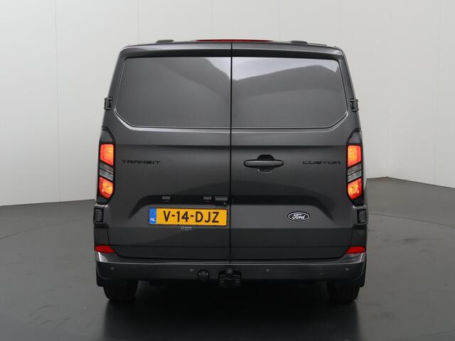 Ford TRANSIT CUSTOM 320 | 2.0 TDCI | L2 H1 | LIMITED | STOELVERWARMING | TREKHAAK | NAVIGATIE | CAMERA | PARKEERSENSOREN | METALLIC | LAADRUIMTE PAKKET | VOORRUITVERWARMING | 2-ZITS | STOEL STOEL | LM VELGEN