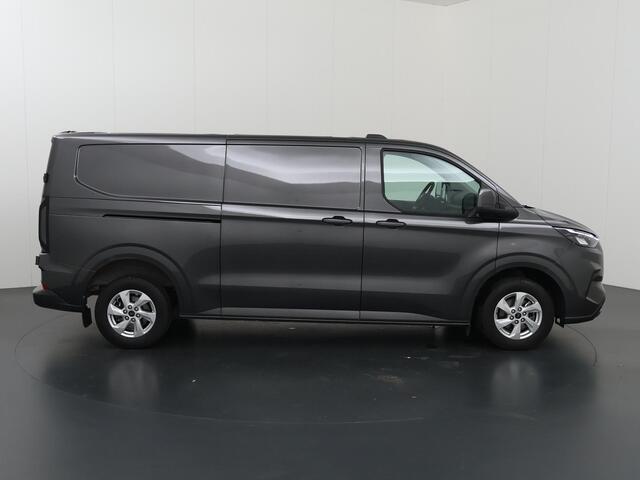 Ford TRANSIT CUSTOM 320 | 2.0 TDCI | L2 H1 | LIMITED | STOELVERWARMING | TREKHAAK | NAVIGATIE | CAMERA | PARKEERSENSOREN | METALLIC | LAADRUIMTE PAKKET | VOORRUITVERWARMING | 2-ZITS | STOEL STOEL | LM VELGEN