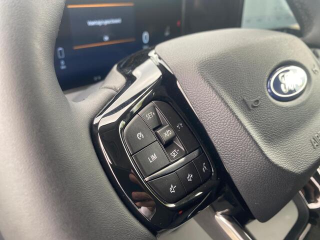 Ford TRANSIT CUSTOM Limited 320 2.5 PHEV L2H1 8-weg verstelbare verwarmbare passagiersstoel | 13 polige trekhaak met Trailer Sway Control | Volwaardig reservewiel | 17 inch lichtmetalen velgen (Carbonised Grey) | AGM accu | PHEV 1-fase oplaadkabel 10m