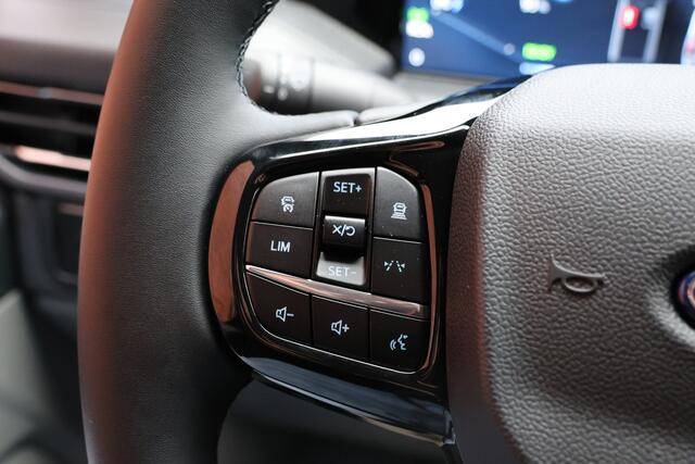 Ford TRANSIT CUSTOM E-Transit 320 L2H1 Limited 65 kWh 218 PK | 328 KM Range | ACC | Blind Spot | L+R Schuifdeur | LED Koplampen + achterlichten | Stuur- en stoelverwarming | CarPlay | Camera | Zero Emission