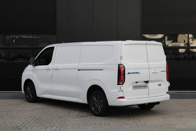 Ford TRANSIT CUSTOM E-Transit 340 L2H1 Limited 65 kWh 218pk - 2x Schuif - LED - 360 Camera - B&O - ACC - Navi - Stoel/Stuurverwarming - Rijklaar