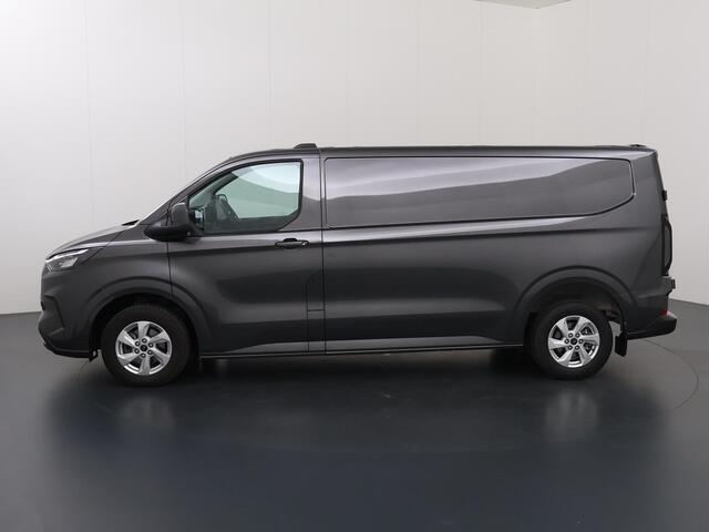 Ford TRANSIT CUSTOM 320 | 2.0 TDCI | L2 H1 | Limited | LM Velgen | 3-zits | Trekhaak | Navigatie | Apple Carplay / Android Auto | Comfort Stoelen | DAB+ | Stoelverwarming | Voorruitverwarming