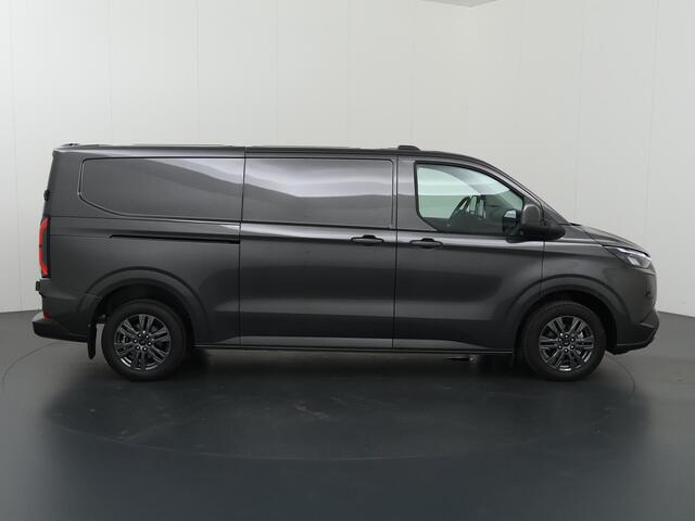 Ford TRANSIT CUSTOM E-Transit 340 | L2 H1 | LIMITED | 65 kWh | 218 PK | 328 KM WLTP | ADAPTIVE CRUISE | LED | STOELVERWARMING | PARKEERPAKKET | NAVIGATIE | 2-ZITS | ELEKTRISCHE TREKHAAK | LAADRUIMTE PAKKET | SNEL LADEN | CARPLAY / ANDROID AUTO | 2300 KG AHW
