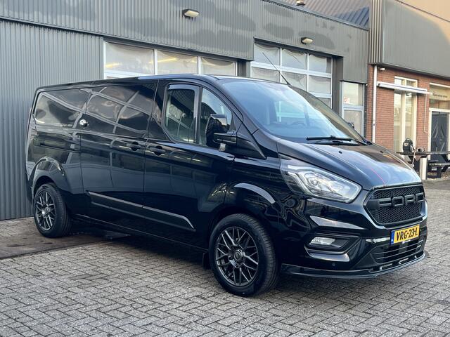 Ford TRANSIT CUSTOM 300 2.0 TDCI L2H1 Sortimo kastinrichting Airco Cruise control Trekhaak 2640kg trekgewicht 3-Persoons Stoelverwarming Bluetooth handsfree Parkeersensoren achter Schuifdeur links en rechts Euro 6