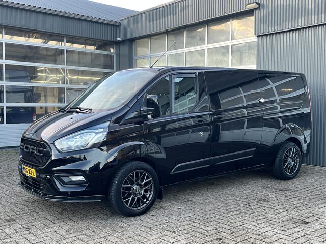 Ford TRANSIT CUSTOM 300 2.0 TDCI L2H1 Sortimo kastinrichting Airco Cruise control Trekhaak 2640kg trekgewicht 3-Persoons Stoelverwarming Bluetooth handsfree Parkeersensoren achter Schuifdeur links en rechts Euro 6