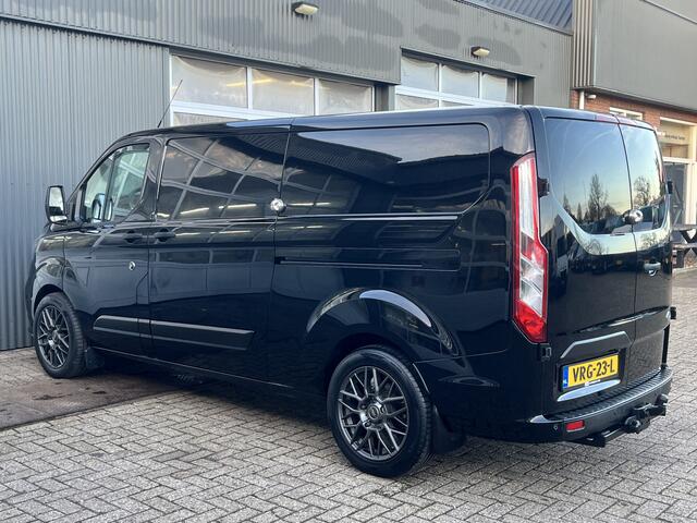 Ford TRANSIT CUSTOM 300 2.0 TDCI L2H1 Sortimo kastinrichting Airco Cruise control Trekhaak 2640kg trekgewicht 3-Persoons Stoelverwarming Bluetooth handsfree Parkeersensoren achter Schuifdeur links en rechts Euro 6