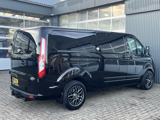 Ford TRANSIT CUSTOM 300 2.0 TDCI L2H1 Sortimo kastinrichting Airco Cruise control Trekhaak 2640kg trekgewicht 3-Persoons Stoelverwarming Bluetooth handsfree Parkeersensoren achter Schuifdeur links en rechts Euro 6