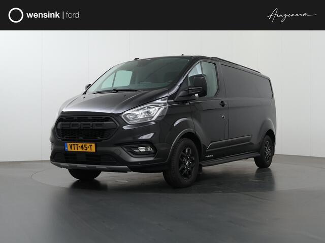 Ford TRANSIT CUSTOM 300 2.0 TDCI L2 H1 | TRAIL UITVOERING | LEDEREN BEKLEDING | NAVIGATIE | CAMERA | CRUISE CONTROL | TREKHAAK | LM VELGEN | TREEPLANKEN | COMPLEET DEALER ONDERHOUDEN