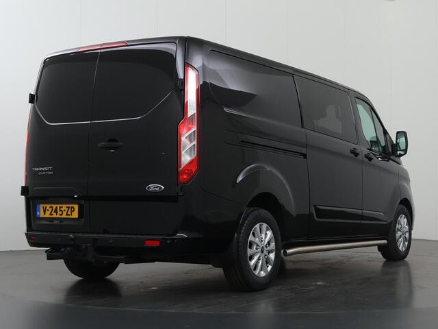 Ford TRANSIT CUSTOM 300 2.0 TDCI | L2 H1 | LIMITED | DUBBEL CABINE | AUT. | LEDEREN BEKLEDING | CAMERA | ADAPTIEVE CRUISE | STOELVERWARMING | NAVIGATIE | BI-XENON | 2X ZIJSCHUIFDEUR | AGATE BLACK METALLIC