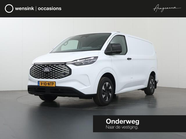 Ford TRANSIT CUSTOM E-Transit 320 | L1 H1 | TREND | 65 kWh | 328 KM RANGE | CLIMATE CONTROL | CARPLAY / ANDROID AUTO | STOELVERWARMING | SPIEGEL VERWARMING | ACHTERUITRIJCAMERA | VOORRUITVERWARMING | LAADRUIMTE PAKKET | VOORBEREIDING 2300 KG TREKHAAK