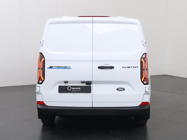 Ford TRANSIT CUSTOM E-Transit 320 | L1 H1 | TREND | 65 kWh | 328 KM RANGE | CLIMATE CONTROL | CARPLAY / ANDROID AUTO | STOELVERWARMING | SPIEGEL VERWARMING | ACHTERUITRIJCAMERA | VOORRUITVERWARMING | LAADRUIMTE PAKKET | VOORBEREIDING 2300 KG TREKHAAK